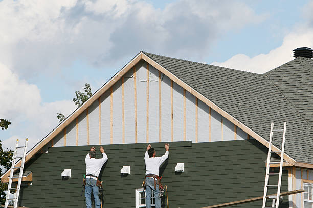 Professional Siding Contractor technician working in Boxford, MA